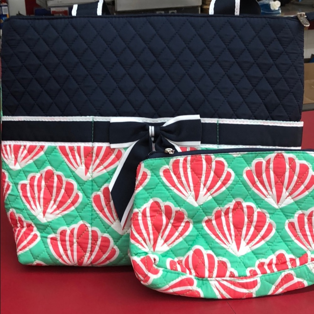 Diaper bag with a small purse.